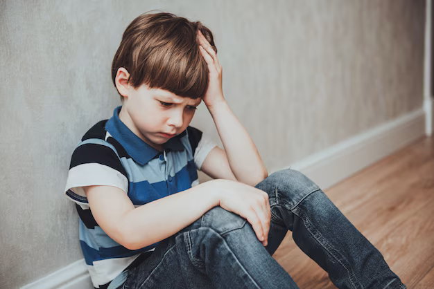 Regret sad little boy sitting alone loneliness stressed depressed child crying having depression anxiety trouble mental health lonely kid boy with hand head 154317 1989